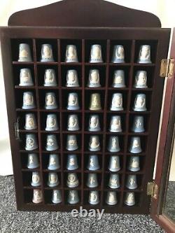 48 Wedgwood jasperware Thimbles in display case all in excellent condition