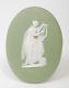 A Wedgwood Green Jasper Ware Oval Plaque Emblematic Of Music Antique C1900