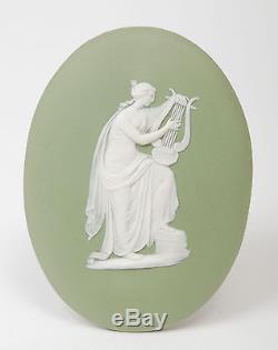 A Wedgwood Green Jasper Ware Oval Plaque Emblematic of Music Antique c1900