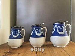 Graduated Set Of Cobalt Jasperware Ribbed Lion Pewter Water Jugs Dudson Wedgwood