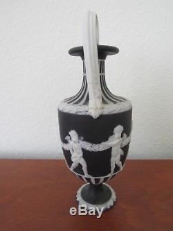 Wedgwood Black dipped jasperware Bacchanalian with engine turned handled vase
