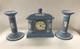 Wedgwood Blue Jasperware Dancing Hours Clock And Candle Sticks Garniture