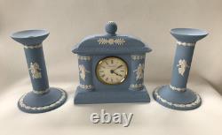 Wedgwood Blue Jasperware Dancing Hours Clock And Candle Sticks Garniture