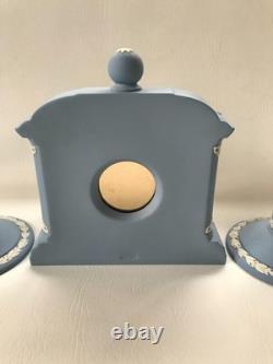 Wedgwood Blue Jasperware Dancing Hours Clock And Candle Sticks Garniture