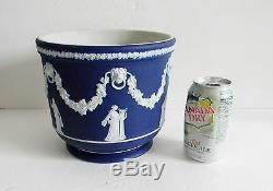 Wedgwood cobalt jasperware jardiniere with floral and lion accents