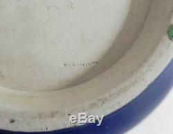 Wedgwood cobalt jasperware jardiniere with floral and lion accents