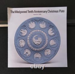 Une collection de dix assiettes de Noël en jaspe Wedgwood 1970-1978 21 cm dans leur boîte